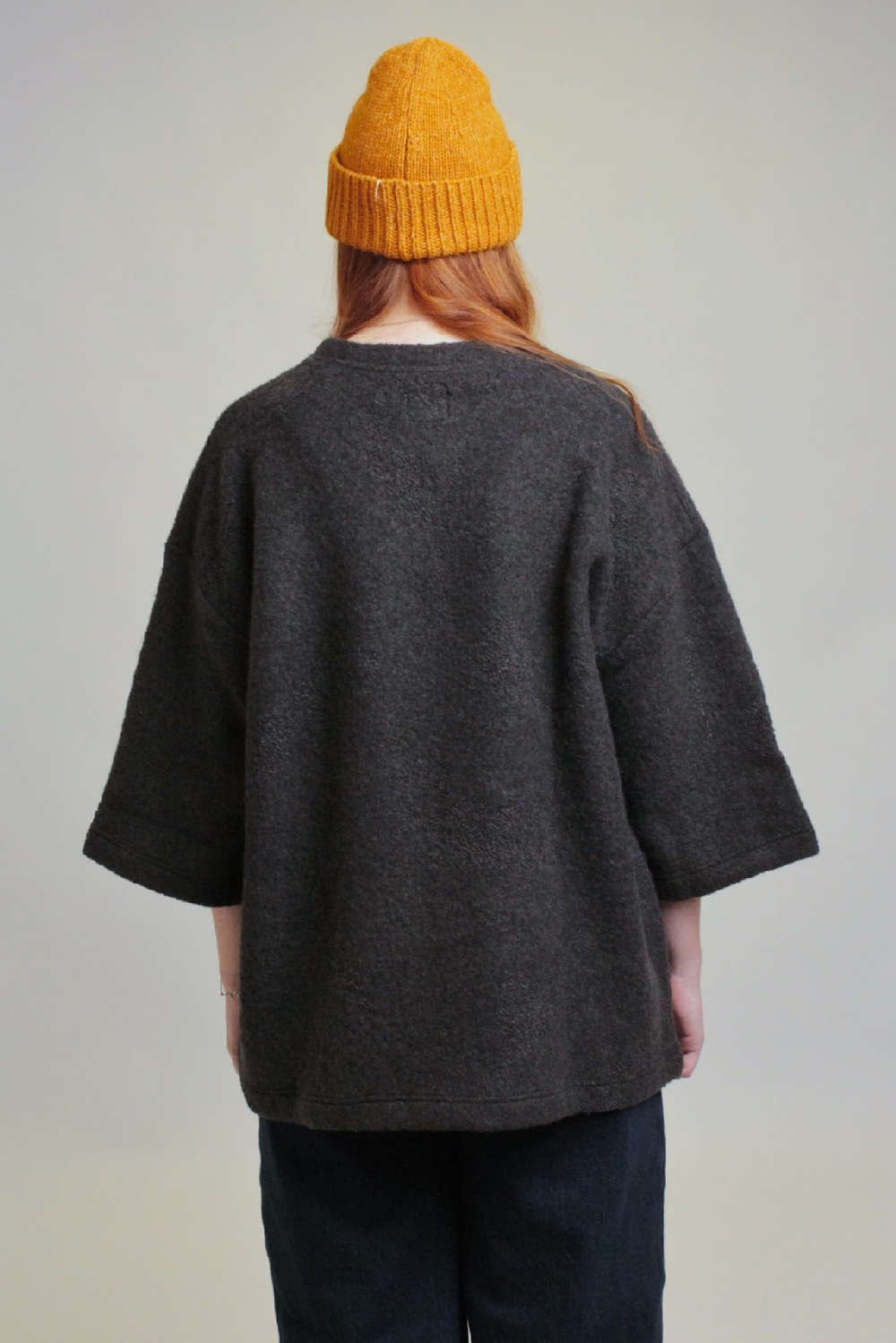 Шапка из шерсти оранжевая