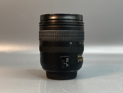 Nikon 18-70mm 3.5-4.5G царапка на передней линзе