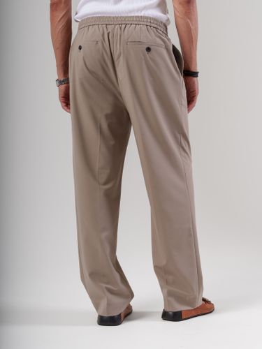 Бежевые брюки Laine