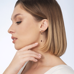 Серьги «Обгоняя время» (пожелание удачи) из красного золота с гранатами