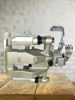 Суппорт тормозной задний левый 583101RA30 для Hyundai Solaris