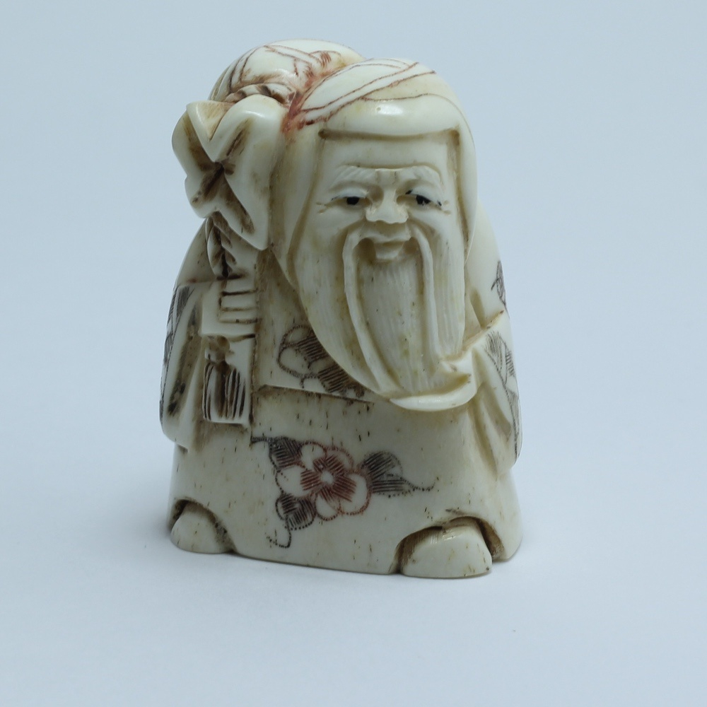 Нэцкэ Фукурокудзю с мешком риса на плече