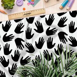 Ткань барби чёрные ладони на белом фоне