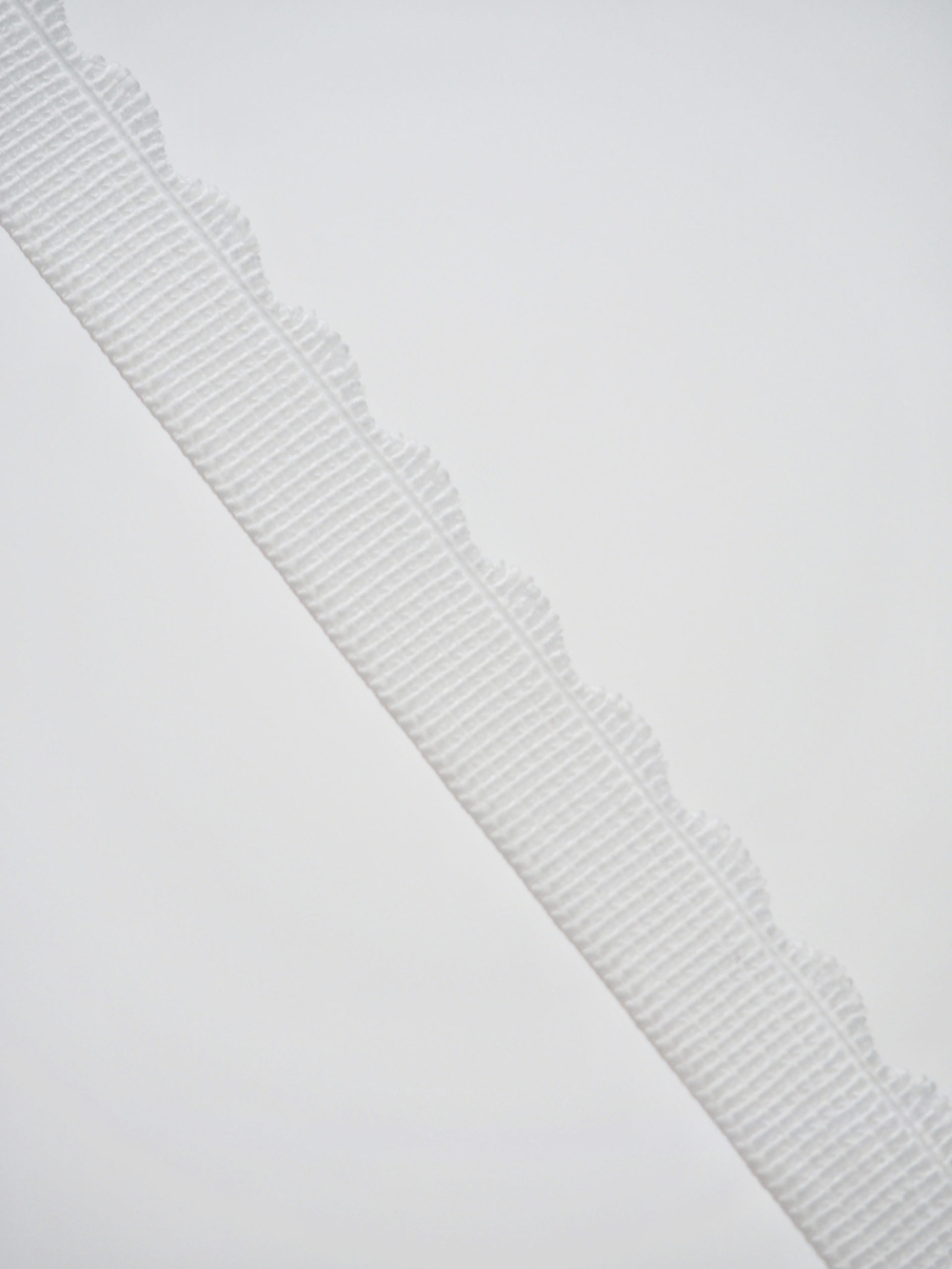 Резинка отделочная белая 12 мм с учетом фестона