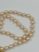 «Жемчужные» бусы со съёмной подвеской Бант