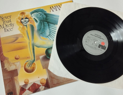 Винтажная виниловая пластинка LP Amanda Lear Never Trust A Pretty Face (Germany 1979) Black Holes