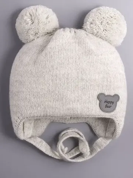 Шапка детская осенняя с завязками и помпонами