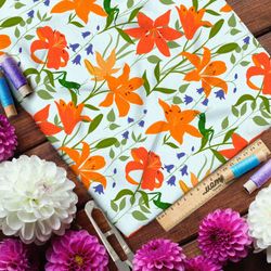 Ткань кулирная гладь красные лилии и мелкие колокольчики