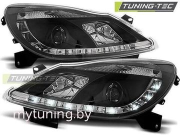 Передние фары Opel Corsa D daylight black