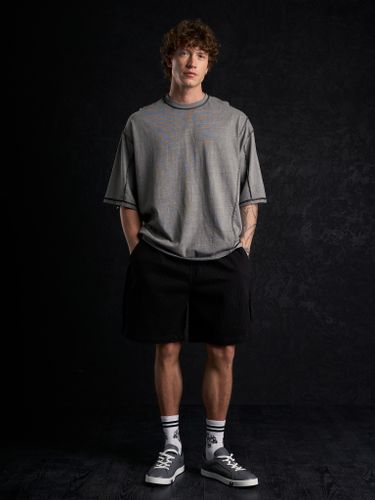 Графитовая оверсайз футболка с вывернутыми швами