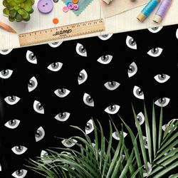 Ткань ниагара серые кошачьи глаза на чёрном фоне