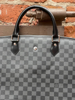 Сумка-кофр Louis Vuitton
