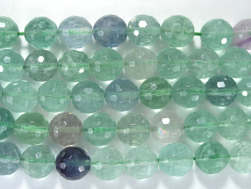 Нить бусин из флюорита зеленого, фигурные, 10 мм (шар, граненые)