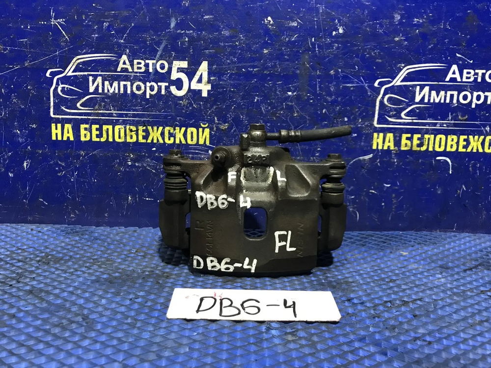 Суппорт тормозной передний левый Honda INTEGRA 1996