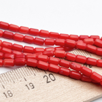 Коралл тонированный бусины, цвет ярко-красный, размер около 4,5*3,2 мм, цена за отрезок 19 см (1/2 нити)