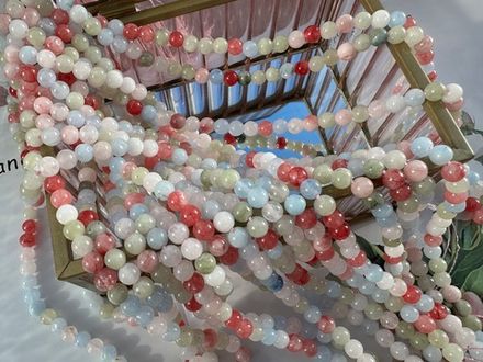 Нить бусин из тонированного кварца 6,5мм, гладкие