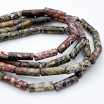 Риолит, размер около 14*4 мм, цена за 13-14 шт (1/2 нити)