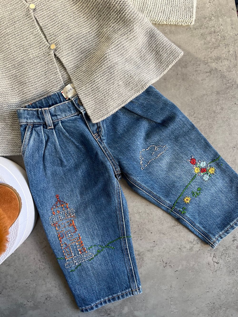 Джинсы Gucci, 86