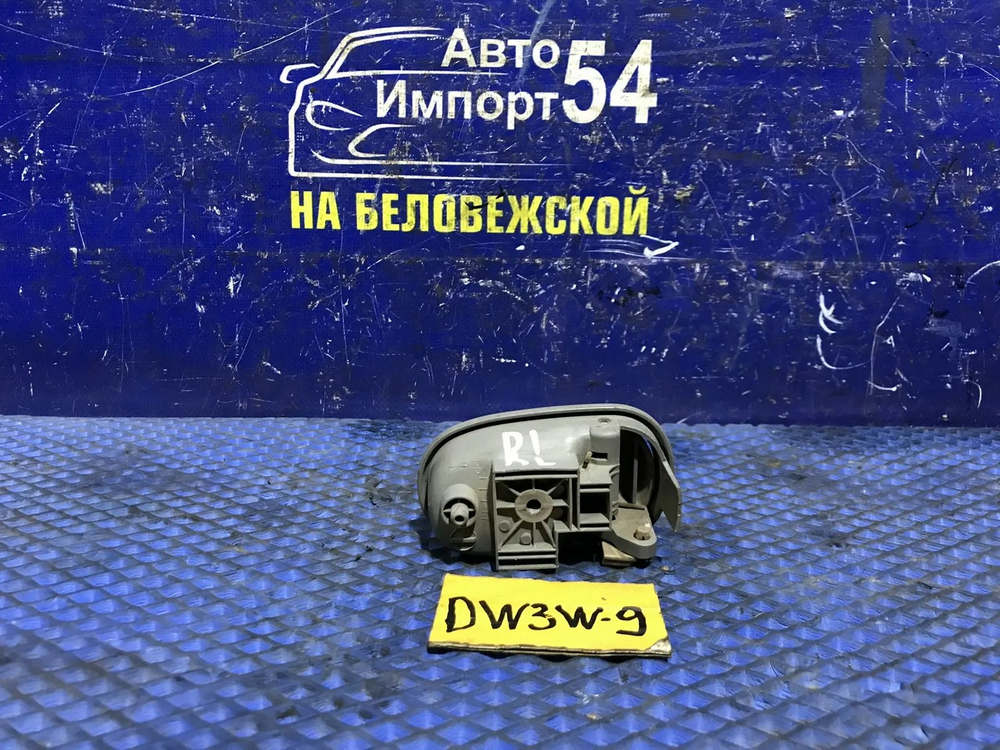 Ручка двери задней левой салонная MAZDA DEMIO 2000