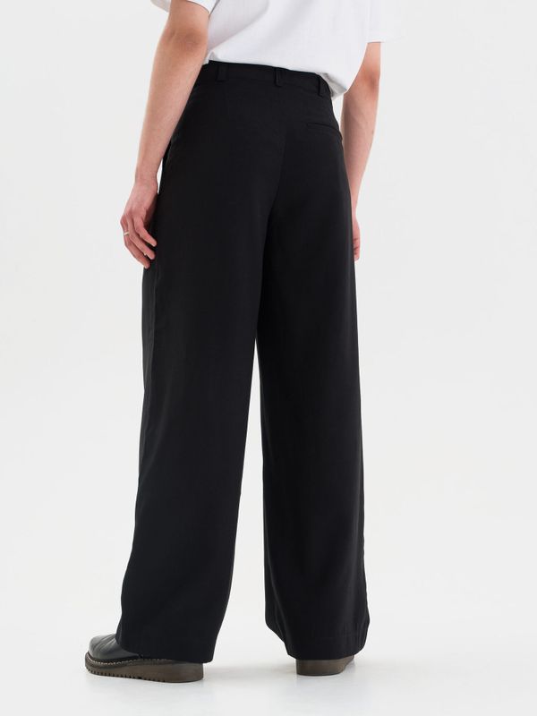 Брюки широкие с защипами черные - фото 2