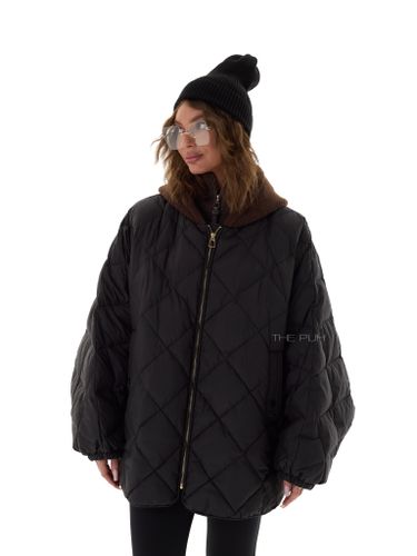 Черный пуховик-летучая мышь с вязаным капюшоном