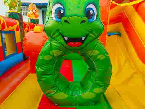 Коммерческий надувной батут «Весёлые динозаврики» с горкой, 5*4*2,8 м