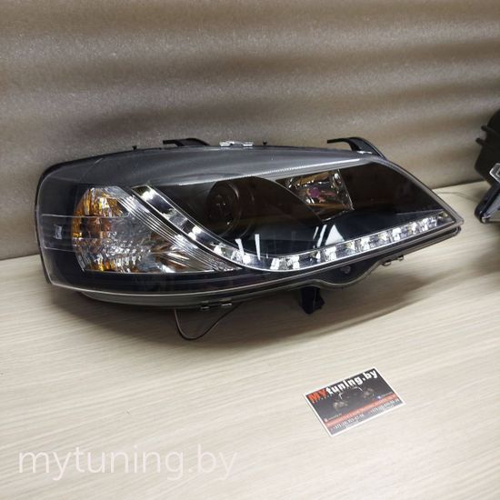 Передние фары Opel Astra G daylight black