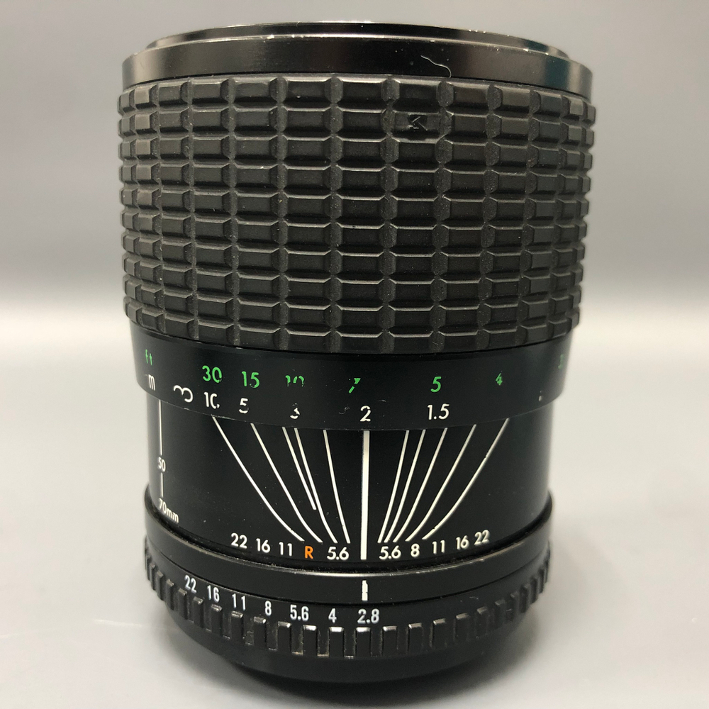 Sigma 35-70mm 2.8-4 M42 со слегка долгой диафрагмой.