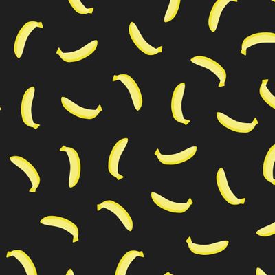 Желтые бананы на черном фоне