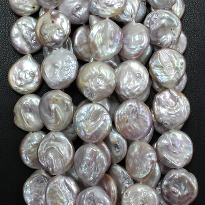 Жемчуг овальный розовый бусины 15мм