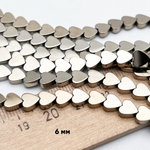 Гематит Сердце бусины (имитация), цвет золотистый, размер около 6,1*6,3 мм, цена за 34-35 шт (1/2 нити)