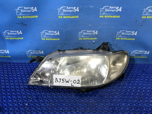 Фара передняя левая MAZDA FAMILIA 2001