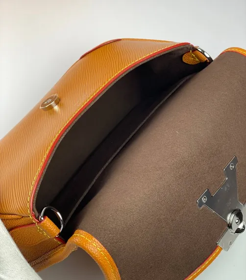 Сумка Louis Vuitton Buci коричневый