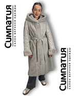 Стильное пальто в серебристом цвете с декоративными деталями