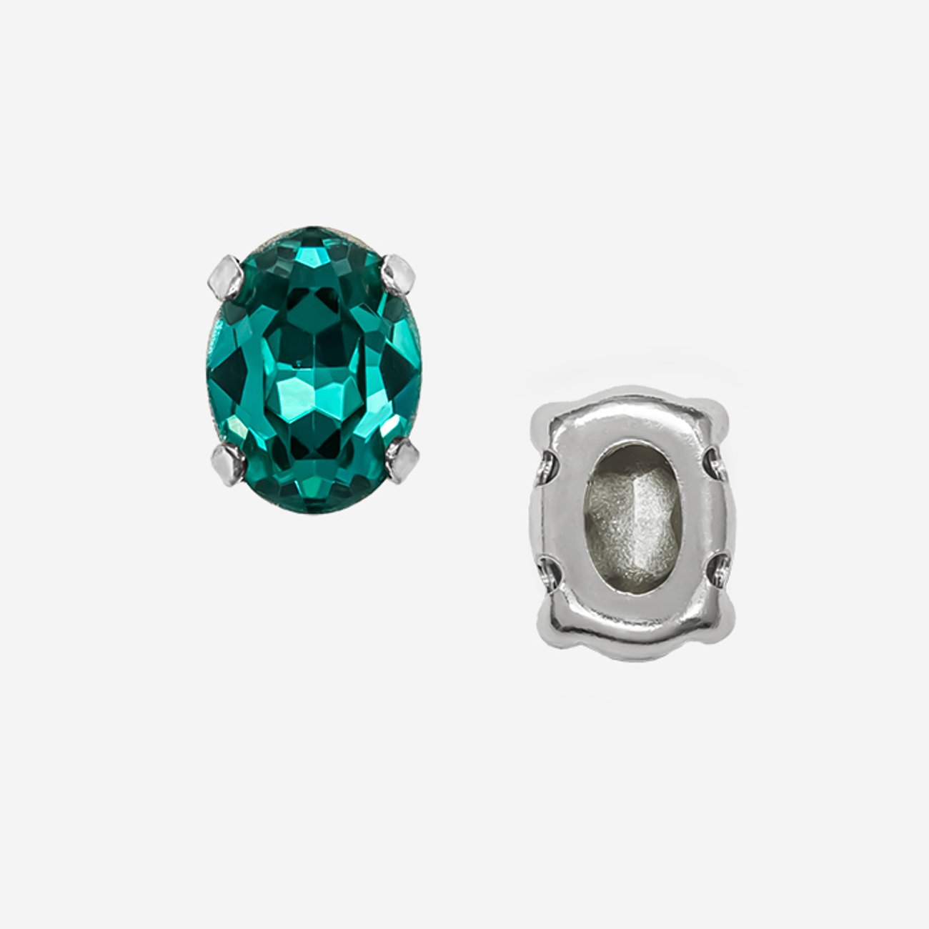 Кристалл Овал (Oval Fancy Stone) в цапах, оттенок "Голубой Циркон"/"Blue Zircon", 8*6мм, родирование