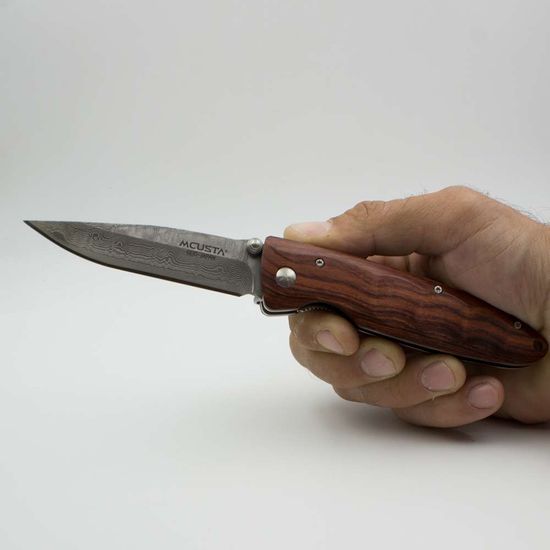 Складной нож Mcusta Classic Wave Damascus, Iron Wood Handle MC-0014DR c клинком из стали VG-10 San Mai (Laminated Stainlesss Damascus) рукоять дерево (Палисандр)