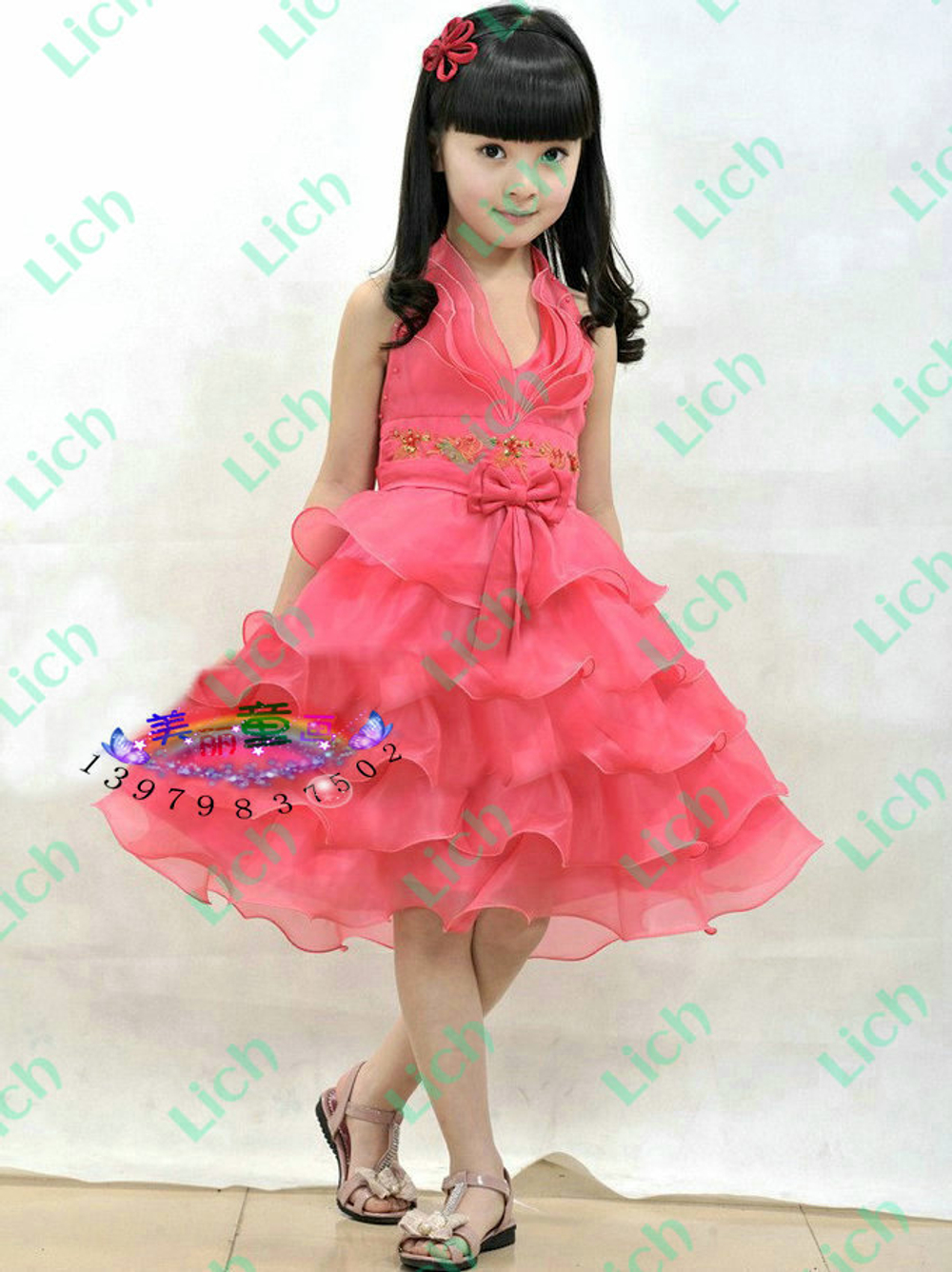 Платье детское с бантом и оборками на юбке