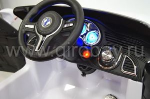 Детский электромобиль River Toys BMW E002KX белый