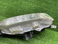 Фара левая Mitsubishi Pajero Sport 2 13-16 ксенон