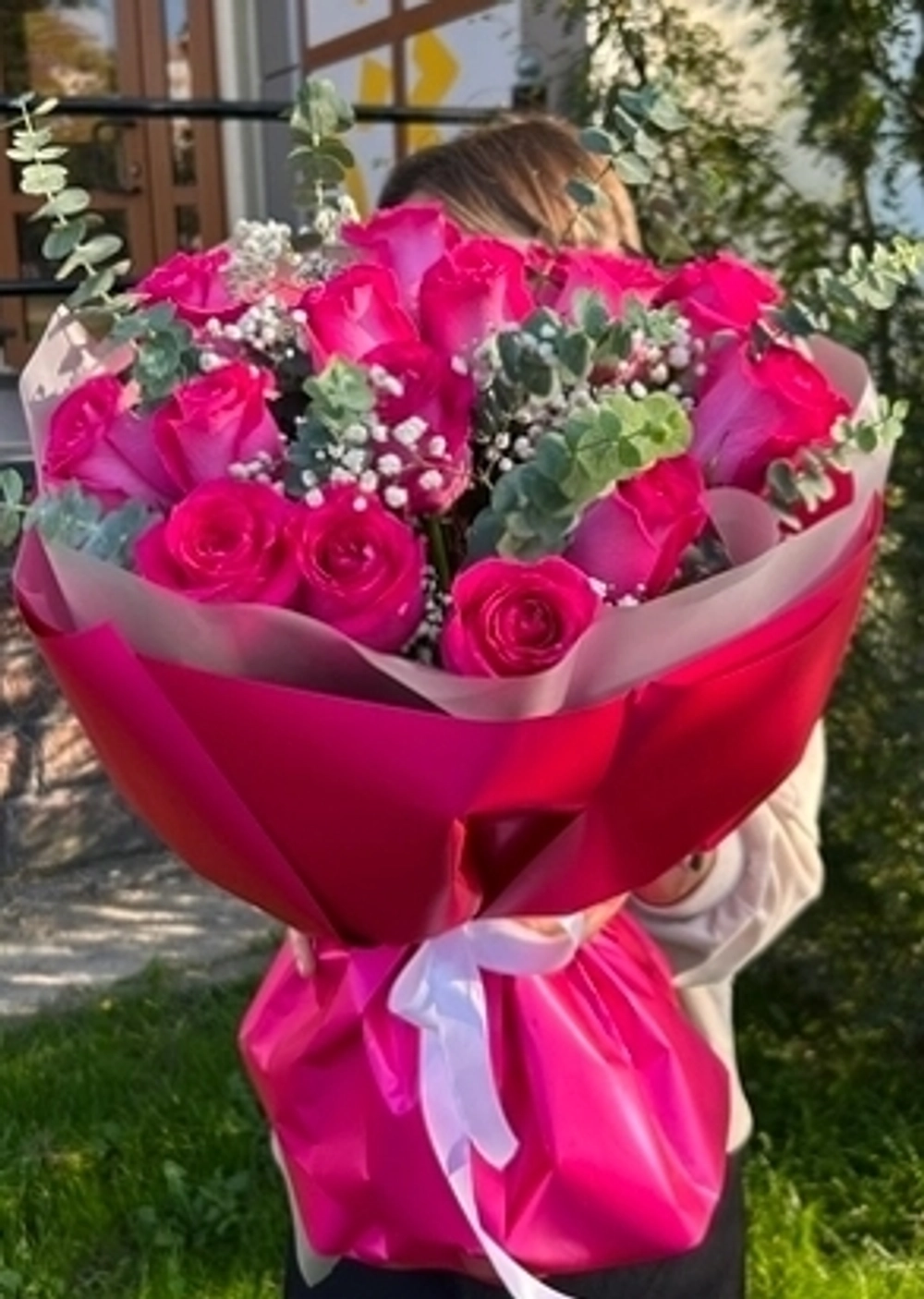 25 red roses + eucalyptus