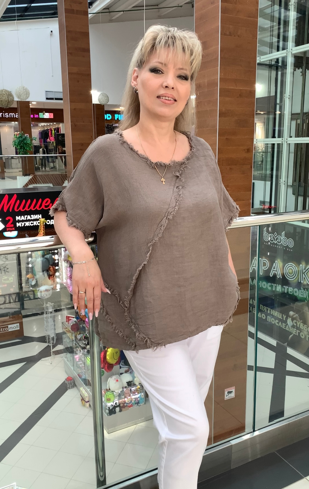 Туника с вывернутыми швами и бахромой