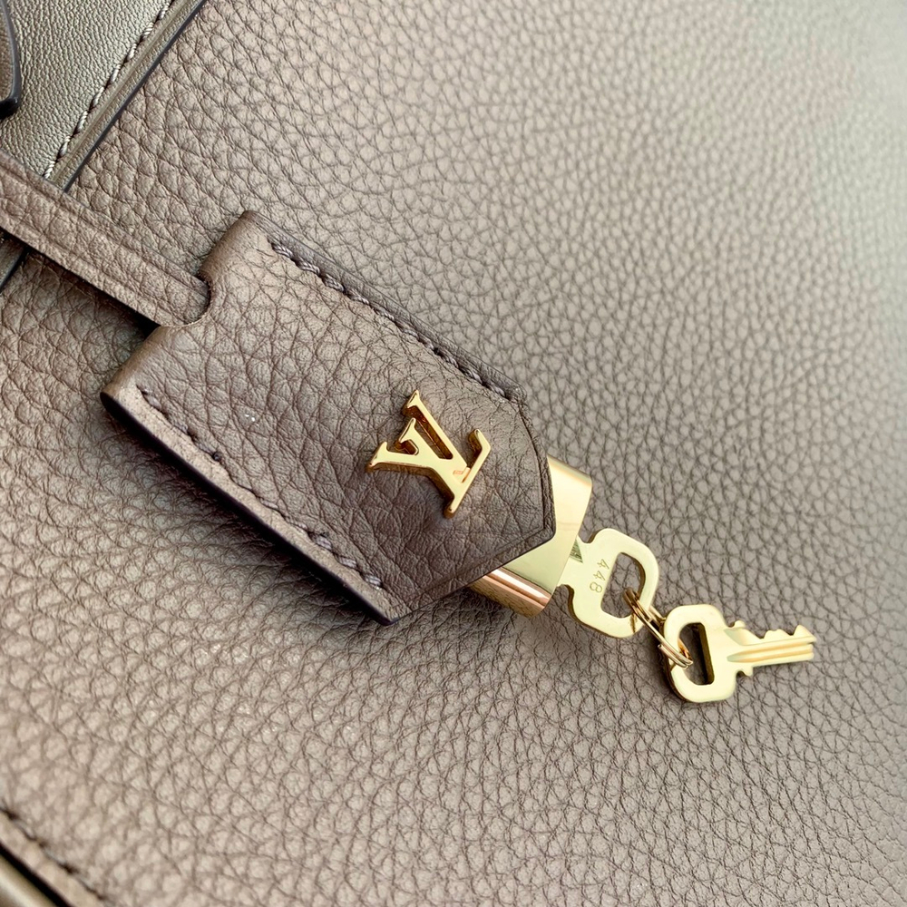 Louis Vuitton Lock It MM Bag