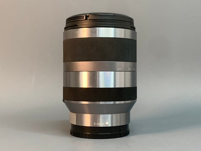 Sony E 18-200mm 3.5-6.3 OSS точки внутри передней линзе