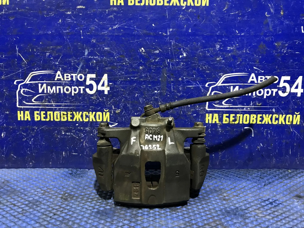 Суппорт тормозной передний левый TOYOTA IPSUM 2001-2009