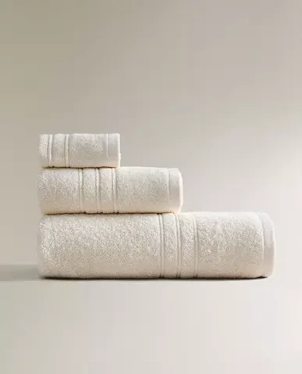 ZARA HOME БАННОЕ ПОЛОТЕНЦЕ С КАЙМОЙ, ЦВЕТ СЛОНОВОЙ КОСТИ