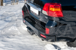 Бампер задний силовой РИФ для Toyota Land Cruiser 200 (2007-2012) стандарт с квадратом под фаркоп и фонарями.