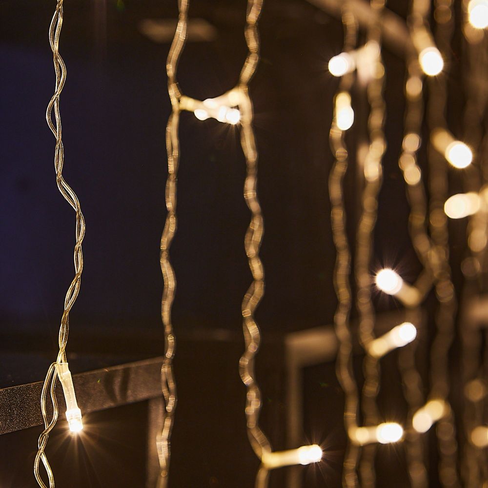 ULD-C3020-160-DTA WARM WHITE IP20 Занавес светодиодный. 3х2м. 160 светодиодов. Теплый белый свет. Провод прозрачный. TM Uniel