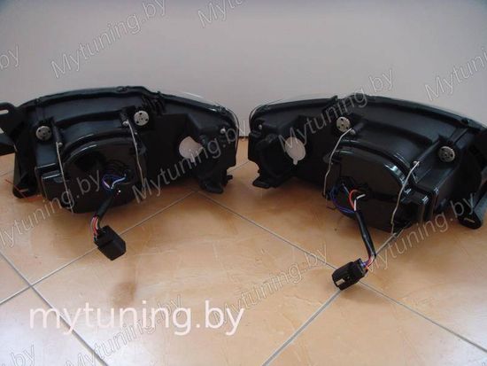 Передние фары Ford Escort 7 angel eyes black