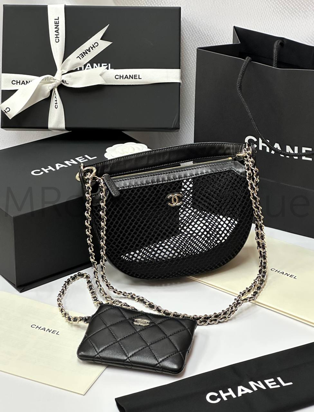 Женская сетчатая сумка Chanel черного цвета