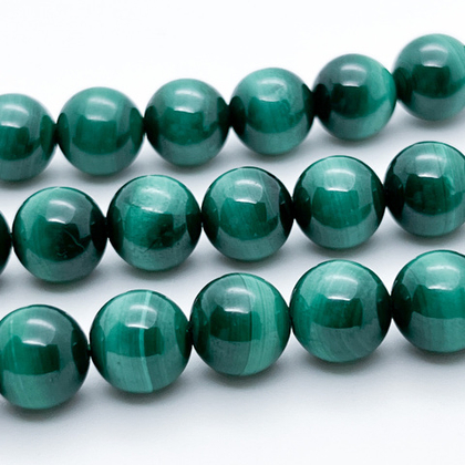 Малахит бусины, диаметр около 10-10,3 мм, цена за 9 шт (1/4 нити)